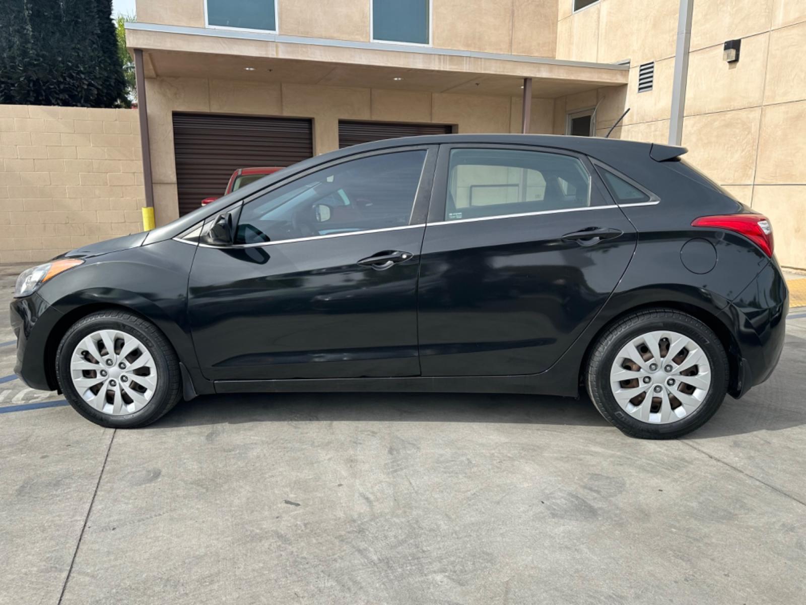 2016 Black Hyundai Elantra GT A/T (KMHD35LHXGU) with an 2.0L L4 16V DOHC engine, 6A transmission, located at 30 S. Berkeley Avenue, Pasadena, CA, 91107, (626) 248-7567, 34.145447, -118.109398 - Are you looking for a stylish and reliable used car, but have bad credit? Look no further than the 2016 Hyundai Elantra GT A/T! This popular car is available at our BHPH dealership in Pasadena, CA, and we offer bad credit auto loans to make it easy for you to get the car you need. The Elantra GT - Photo #1